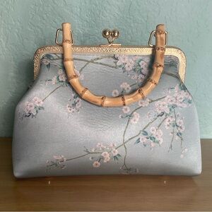 Elegant Floral Handbag with Bamboo Handle